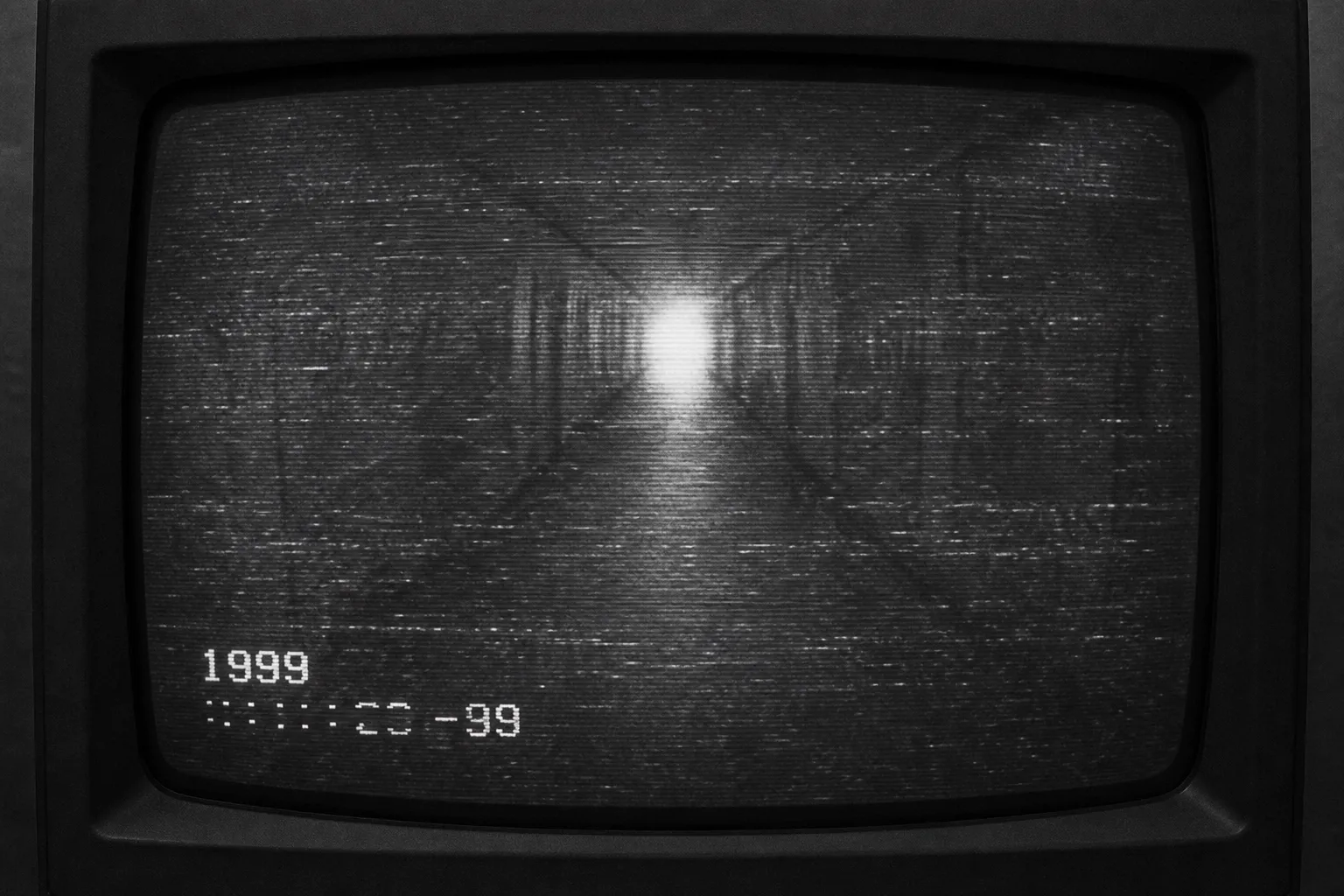 Surveillance camera view of a long institutional corridor with fluorescent lighting